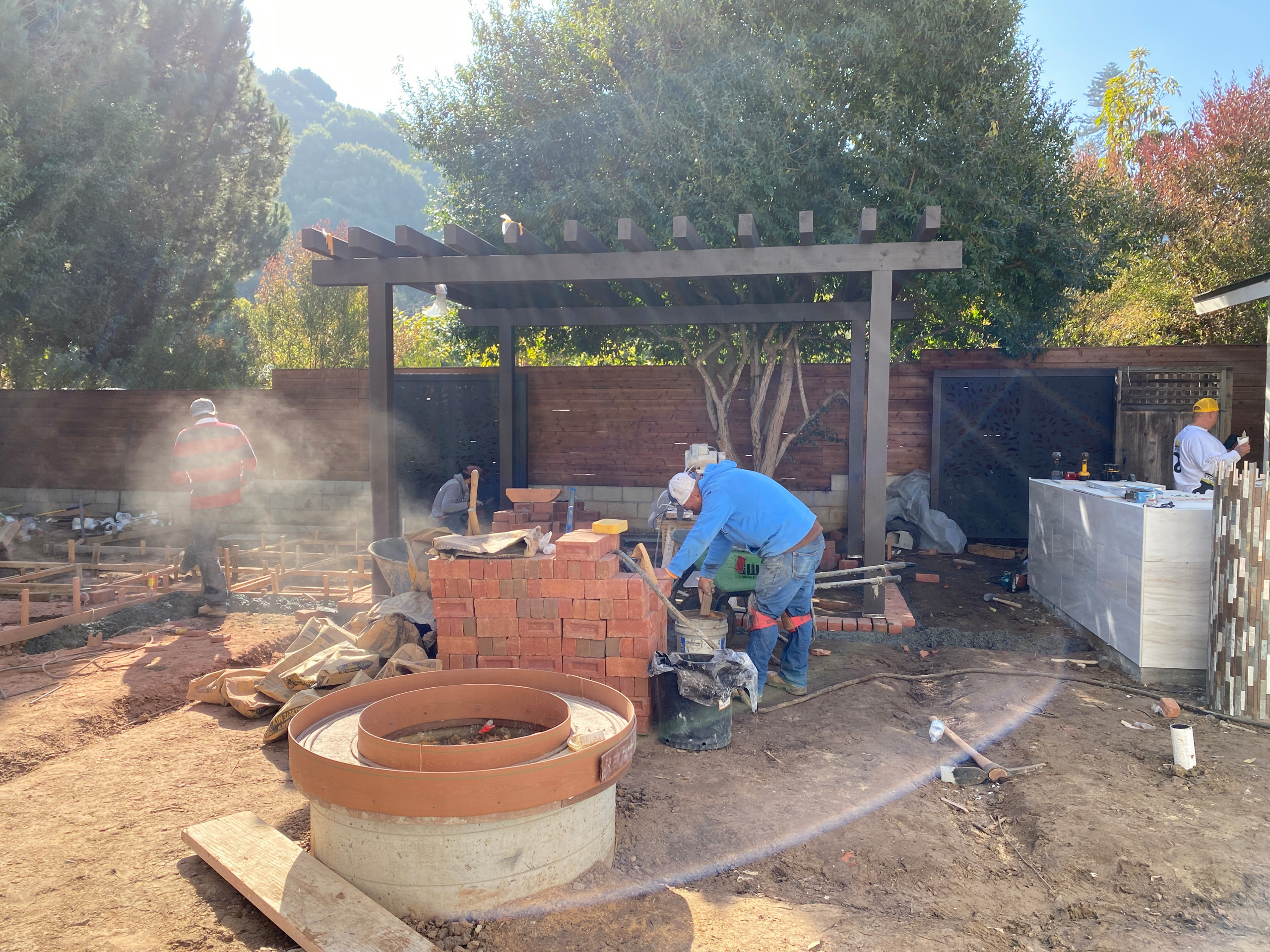 Building a Fire Pit and Pouring a Concrete Cap in La Jolla Backyard