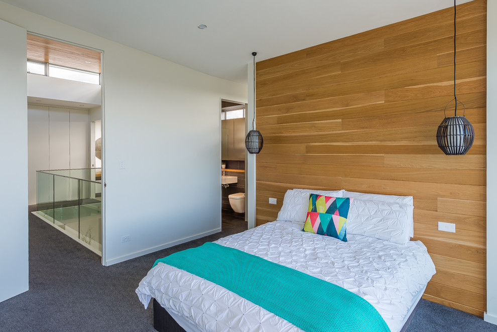 Inspiration for a contemporary master bedroom in Sydney with white walls and carpet.