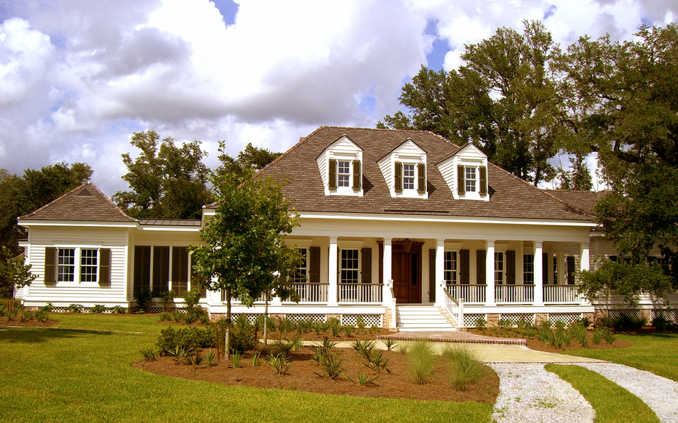 This is an example of a traditional exterior in New Orleans with wood siding.