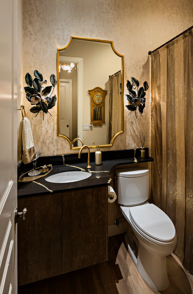 This is an example of a transitional powder room in Phoenix.