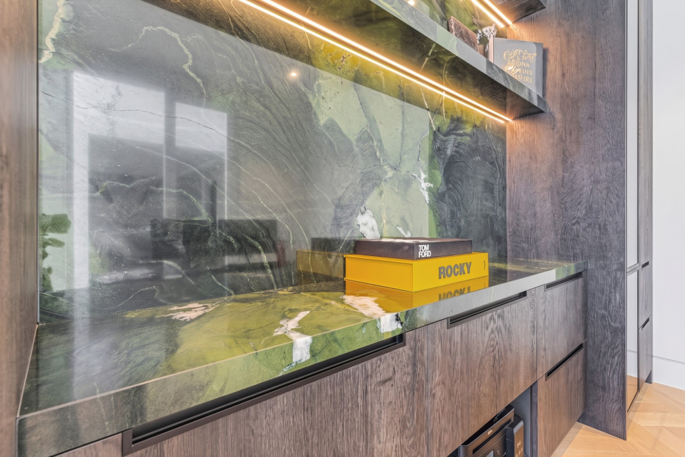Example of a transitional home design design in Toronto
