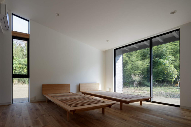 長南町のヴィラ　メインベッドルーム minimalistisch-schlafzimmer