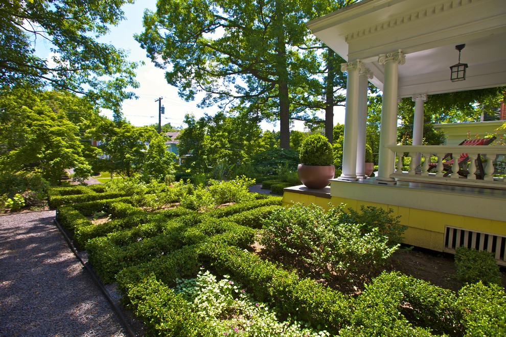 Photo of a large arts and crafts front yard partial sun formal garden in New York with a garden path and gravel.