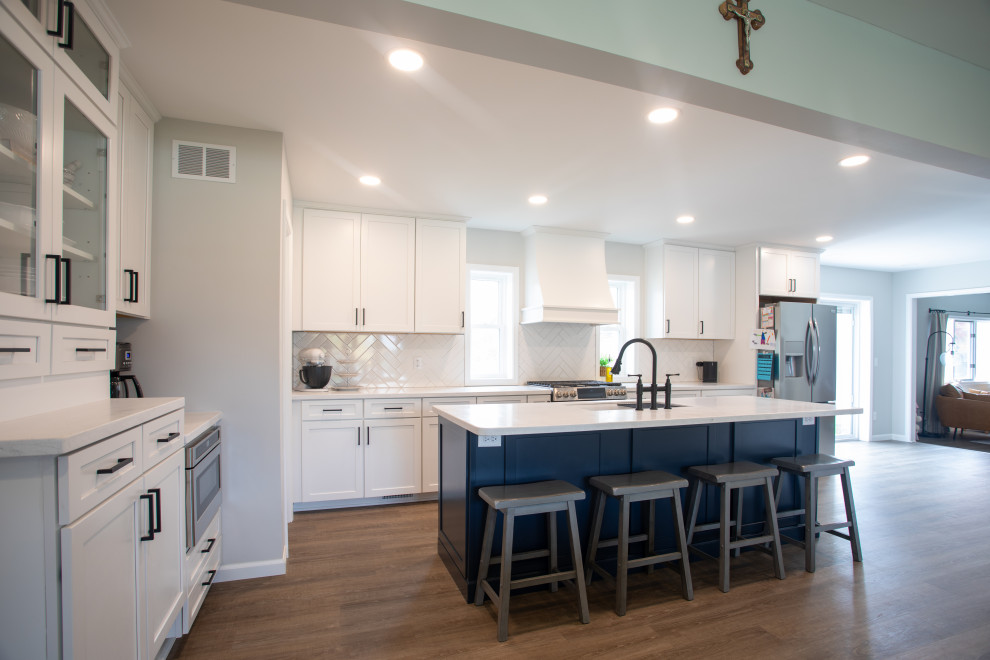 Example of a transitional vinyl floor kitchen/dining room combo design