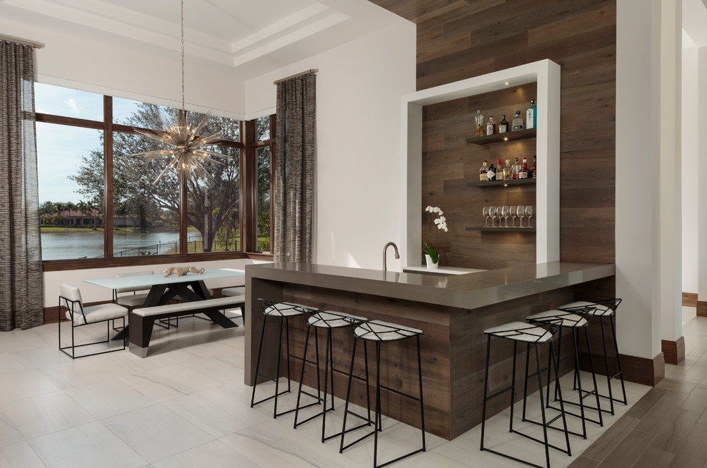 Mid-sized modern l-shaped seated home bar in Miami with an undermount sink, flat-panel cabinets, brown cabinets, brown splashback, timber splashback and beige floor.
