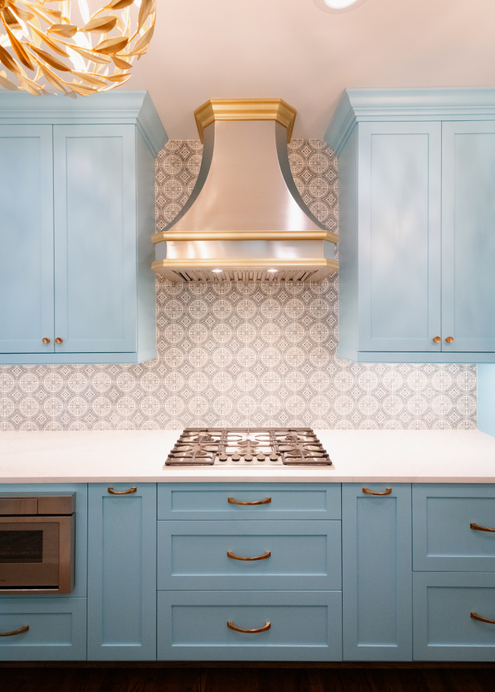 Kitchen - mid-sized transitional galley medium tone wood floor and brown floor kitchen idea in Charleston with an undermount sink, shaker cabinets, turquoise cabinets, quartz countertops, multicolored backsplash, marble backsplash, stainless steel appliances and white countertops