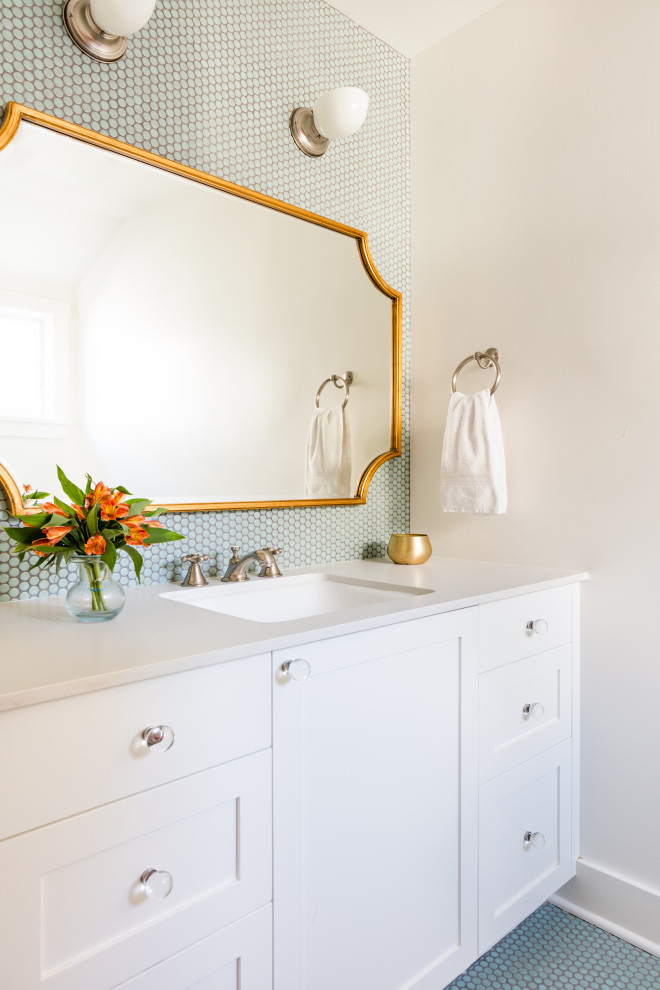 Photo of a mid-sized traditional bathroom in Seattle with white cabinets, an alcove tub, a shower/bathtub combo, white tile, ceramic tile, ceramic floors, engineered quartz benchtops, green floor and a shower curtain.