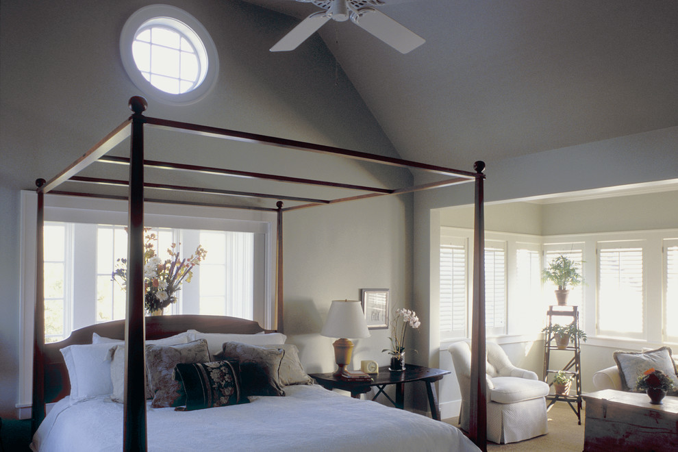 Inspiration for a large traditional master bedroom in Houston with grey walls, carpet, no fireplace and beige floor.