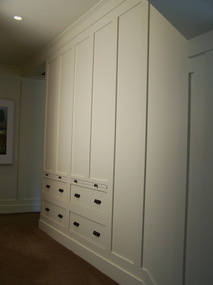 Drawers built into wall paneling Traditional Wardrobe Boston by