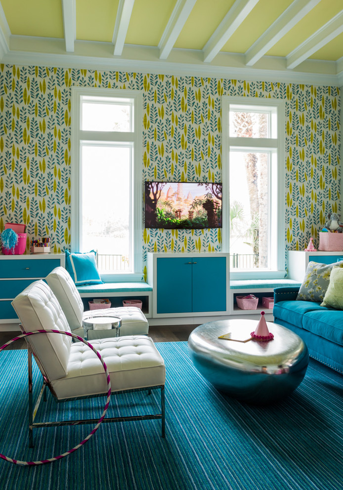 This is an example of a transitional family room in Jacksonville with a wall-mounted tv and multi-coloured walls.
