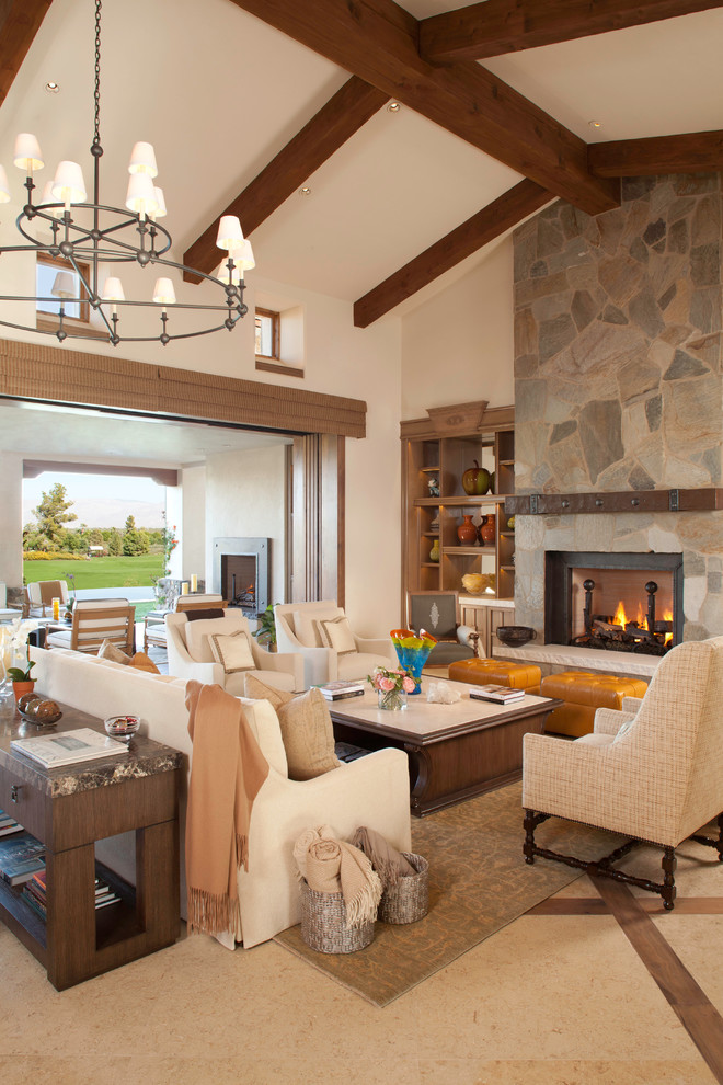 Photo of a transitional formal living room in Los Angeles with a stone fireplace surround and no tv.