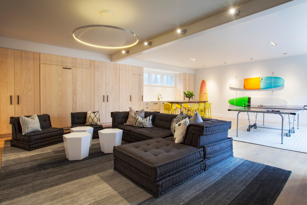 Modern Beach House - Basement - coastal look-out light wood floor and beige floor basement idea in Boston with white walls