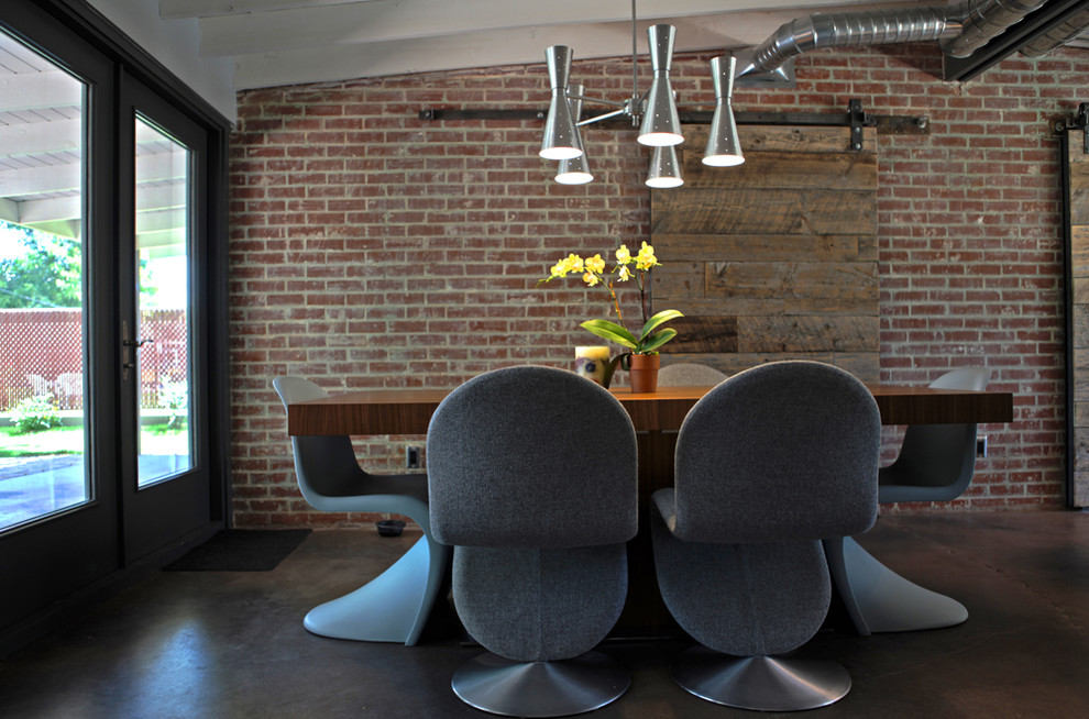 Industrial dining room in Phoenix with concrete floors.