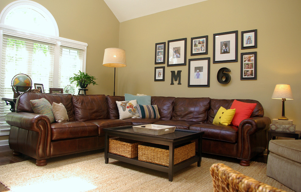 This is an example of a mid-sized modern open concept family room in DC Metro with beige walls and dark hardwood floors.