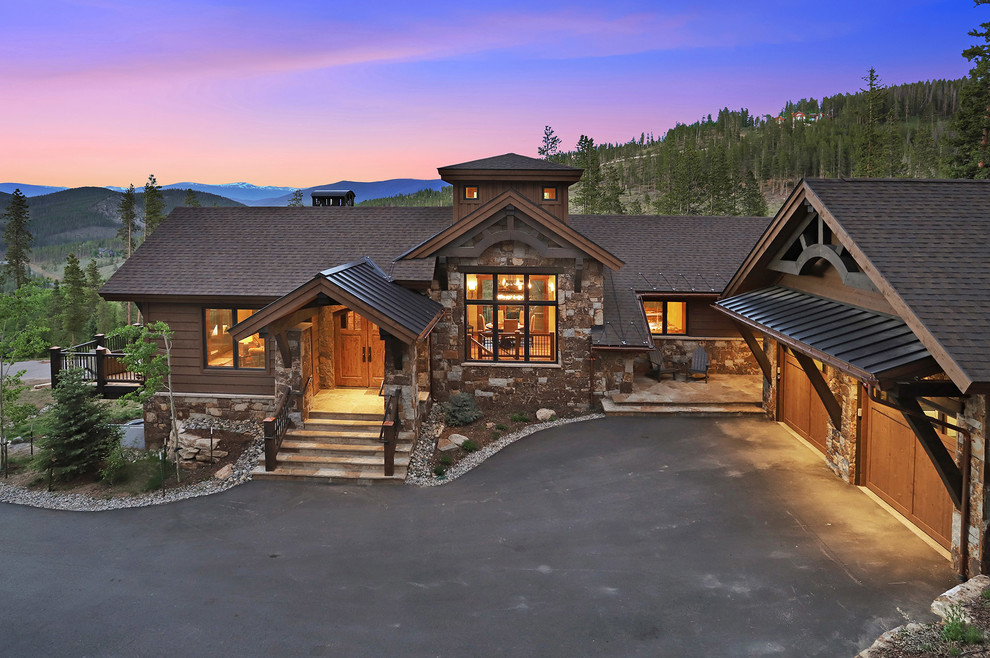 Mountain style home design photo in Denver