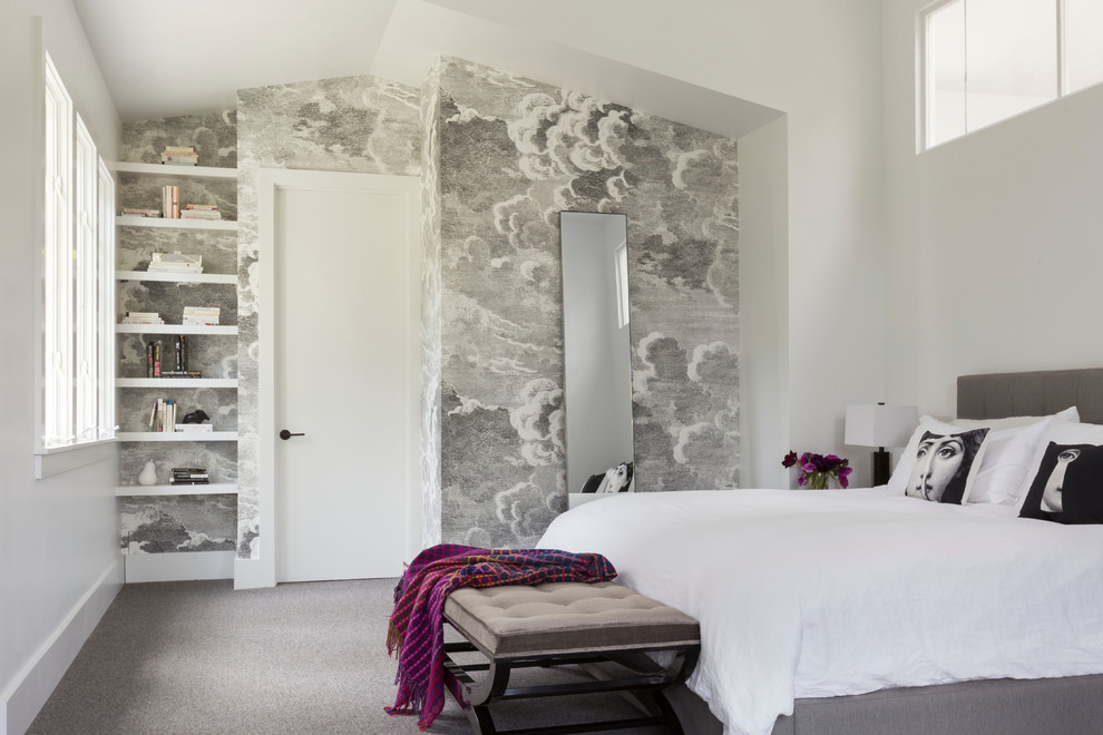 This is an example of a contemporary master bedroom in San Francisco with white walls, carpet and no fireplace.