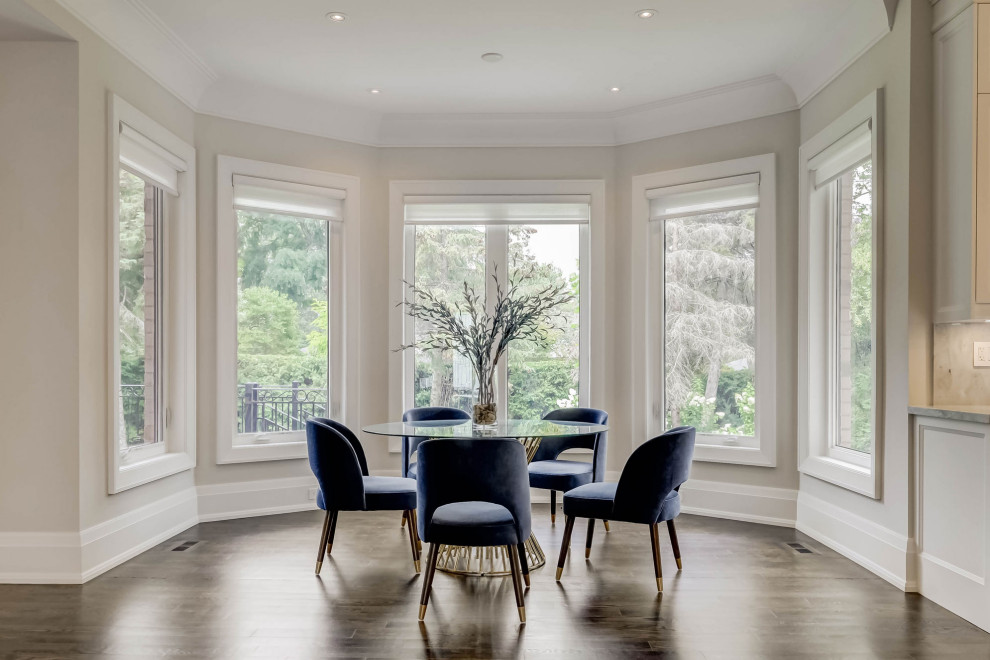Example of a transitional kitchen design in Toronto
