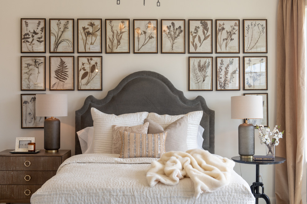 This is an example of a transitional bedroom in Salt Lake City with beige walls.