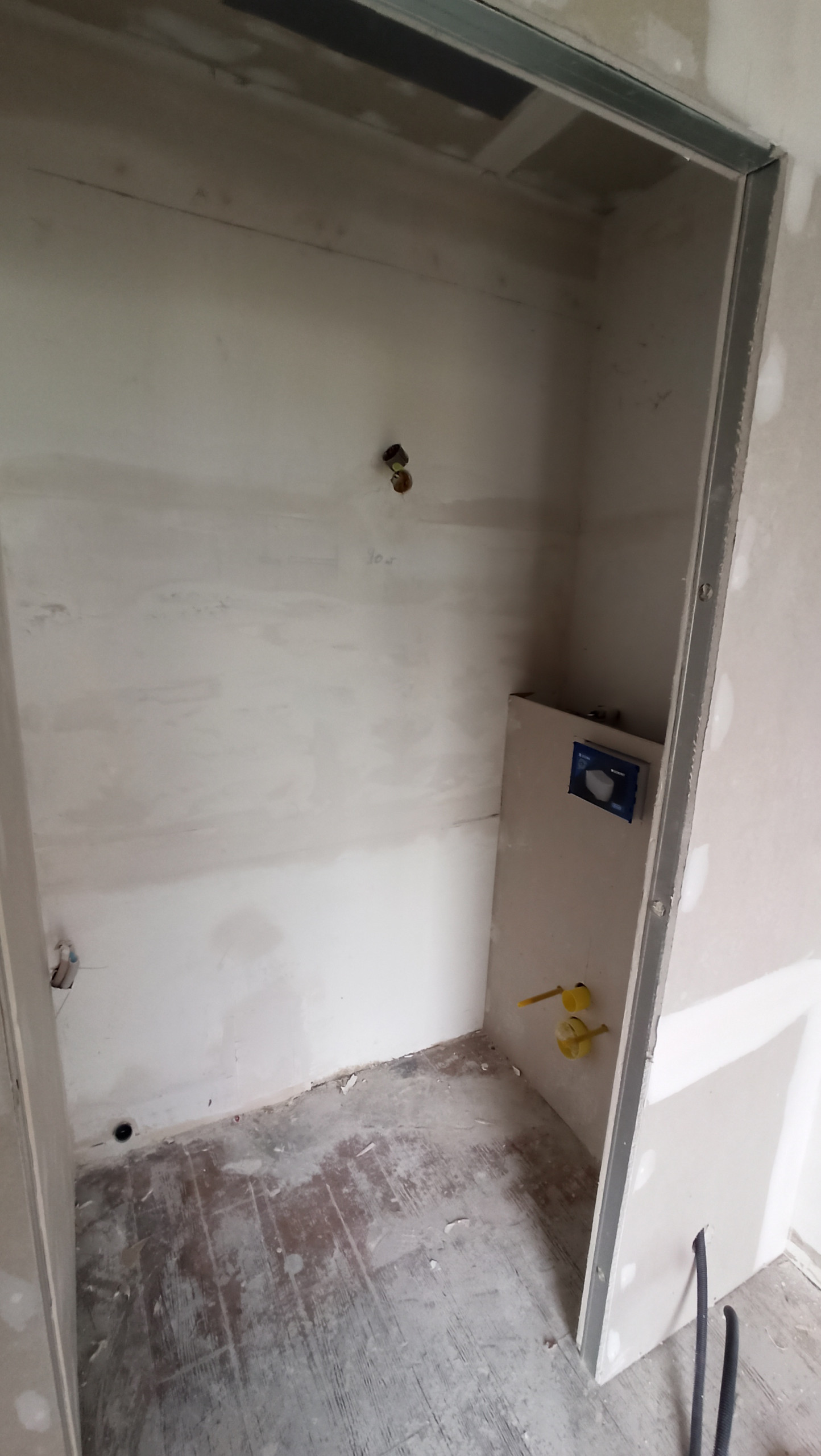 Transformation d'une chambre parentale en pièce de vie/cuisine