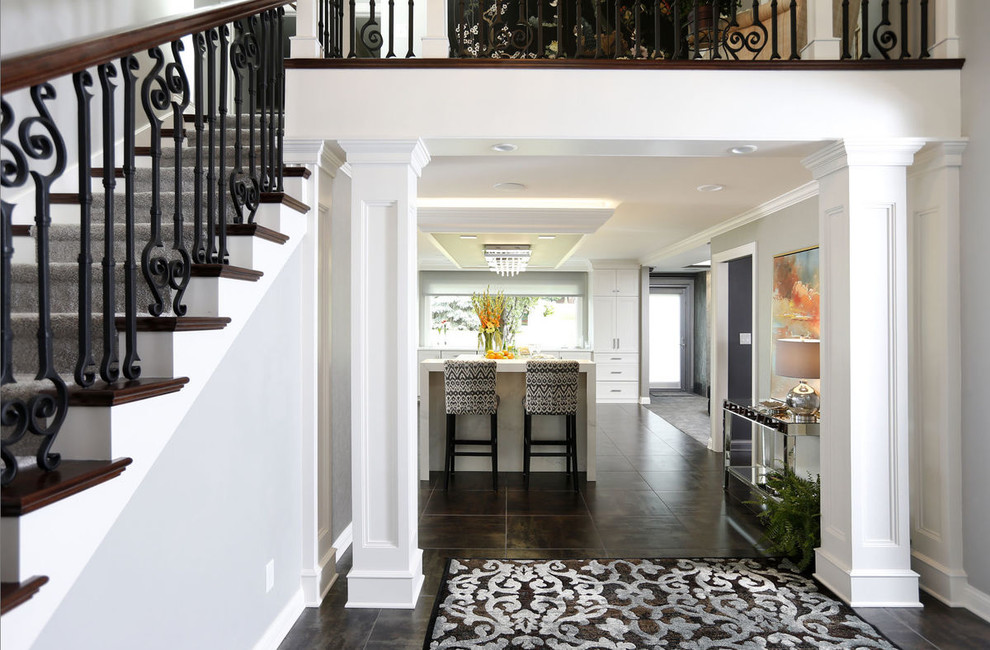 Transitional porcelain tile and gray floor entryway photo in Cedar Rapids
