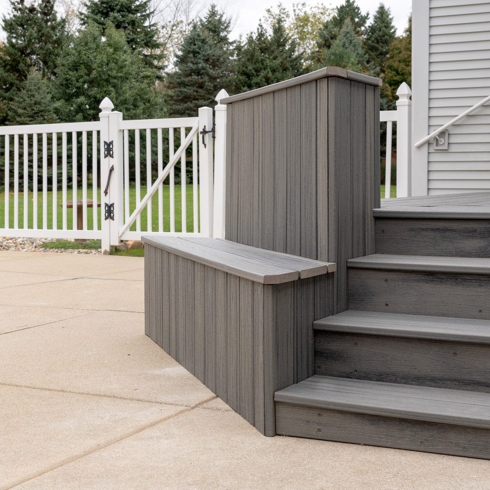 This is an example of a small contemporary backyard deck in Other with no cover.