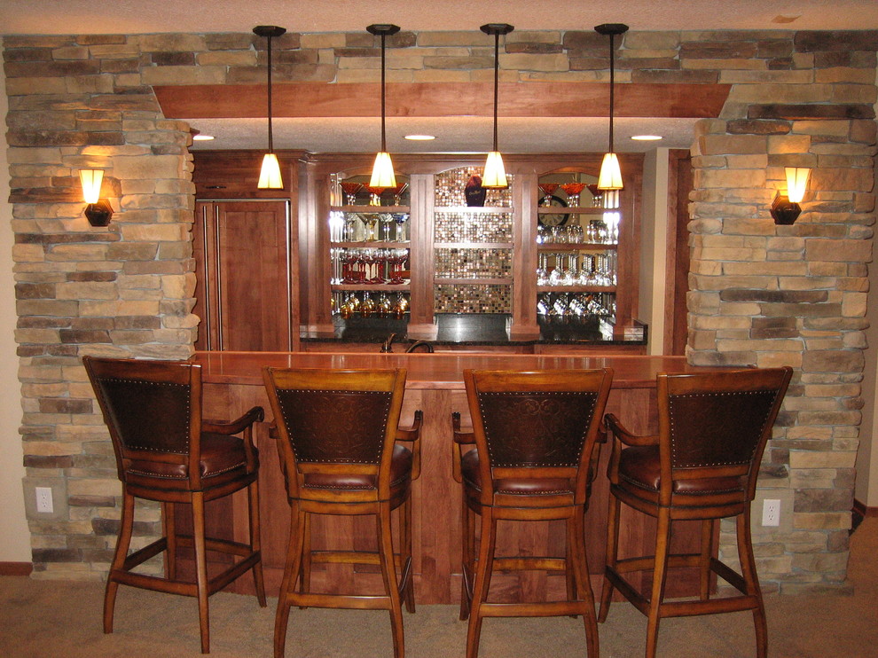 Design ideas for a traditional home bar in Minneapolis.