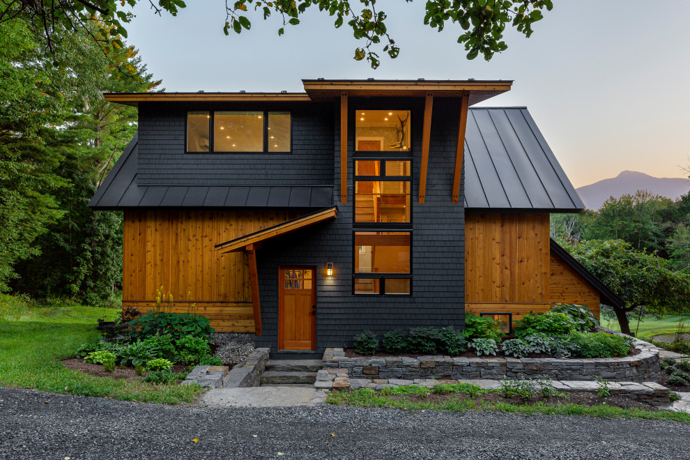 Rustic exterior home idea in Burlington