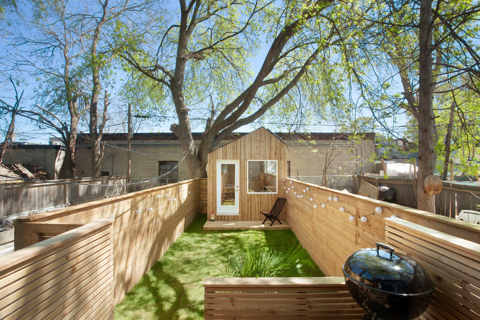This is an example of a small contemporary detached studio in Toronto.