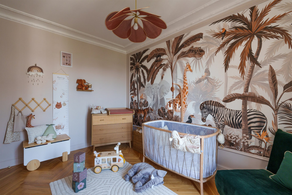 Design ideas for a mid-sized eclectic nursery in Paris.