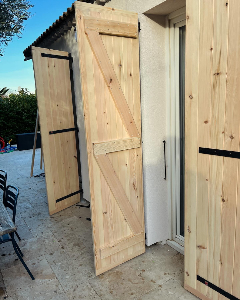 Fabrication et pose de volets à écharpes