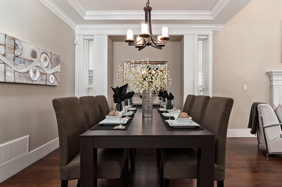 This is an example of a transitional dining room in Other with beige walls.