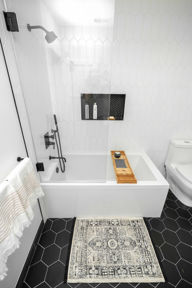 Mid-sized modern kids bathroom in Dallas with furniture-like cabinets, medium wood cabinets, a corner tub, a shower/bathtub combo, black and white tile, mosaic tile, white walls, ceramic floors, an undermount sink, quartzite benchtops, black floor, a hinged shower door, white benchtops, a niche, a single vanity and a freestanding vanity.