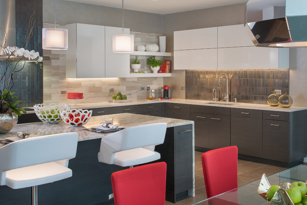 This is an example of a contemporary eat-in kitchen in New York with quartz benchtops.