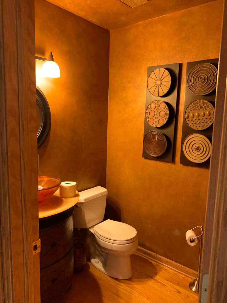 Photo of a transitional powder room in Omaha.