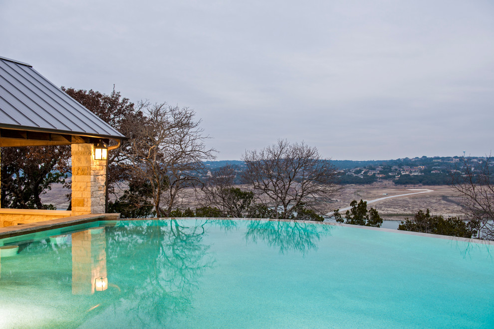 Mountain style pool photo in Austin