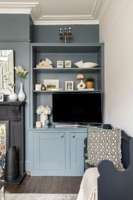 Calm & serene living room with a mix of chrome & brass metal accents traditional-living-room