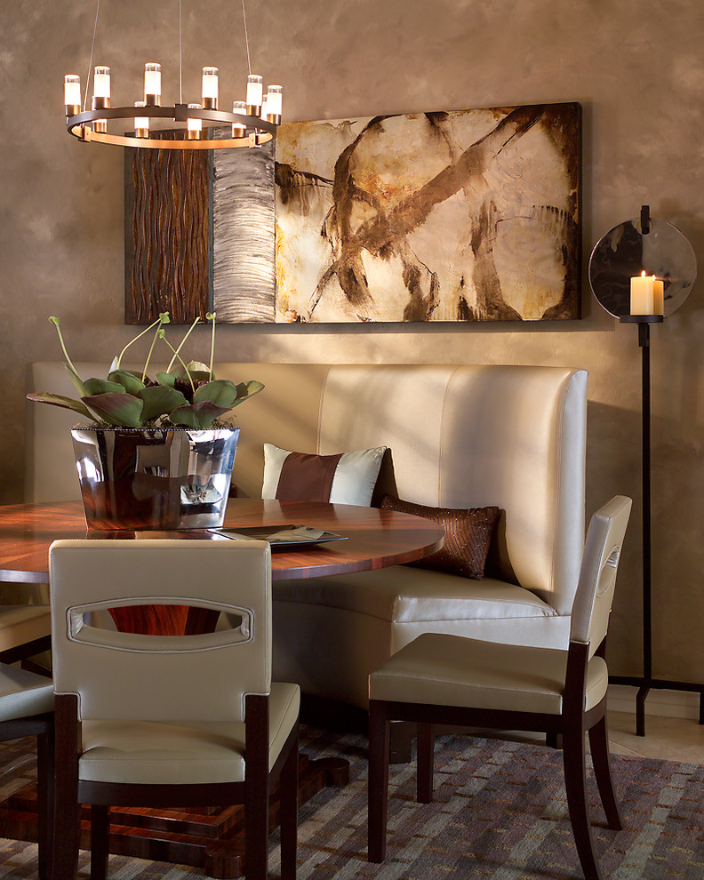Design ideas for a contemporary dining room in Phoenix with beige walls.