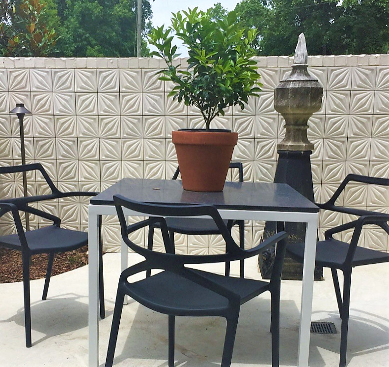 Photo of a mediterranean backyard patio in Vancouver with tile.