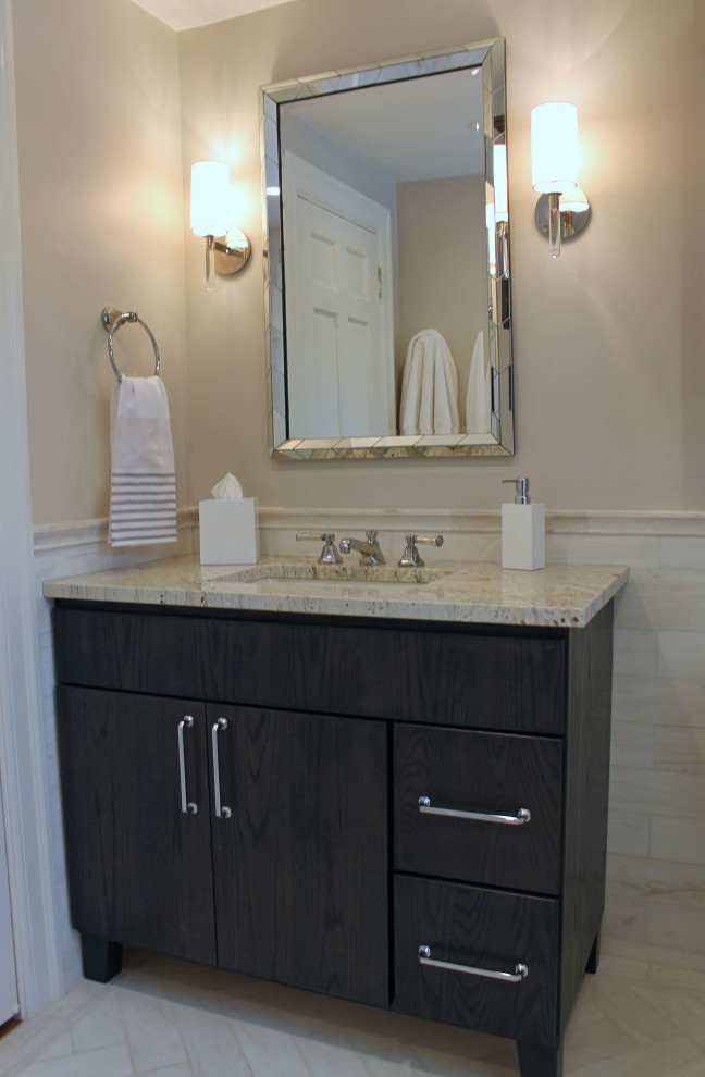 This is an example of a small traditional kids bathroom in Boston with flat-panel cabinets, dark wood cabinets, an alcove tub, a shower/bathtub combo, a two-piece toilet, multi-coloured tile, marble, grey walls, marble floors, an undermount sink, granite benchtops, multi-coloured floor, a shower curtain, multi-coloured benchtops, a single vanity and a freestanding vanity.