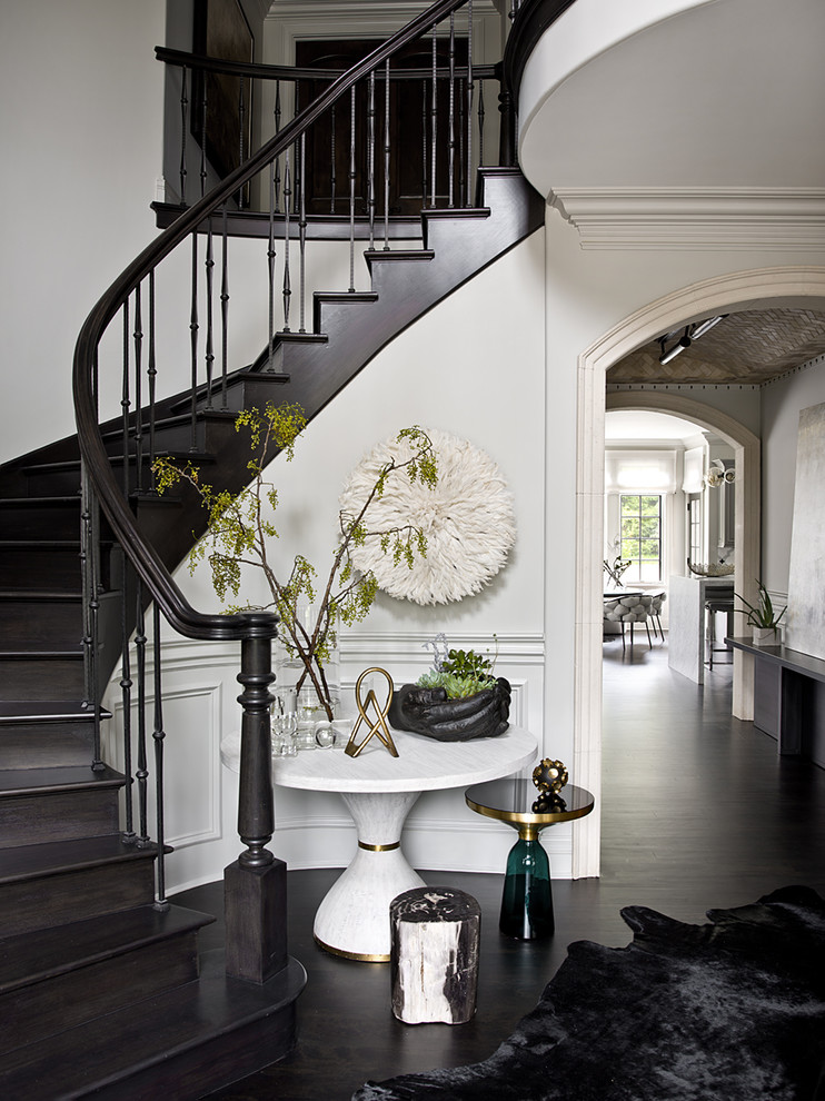 Design ideas for a transitional foyer in Chicago with grey walls and dark hardwood floors.