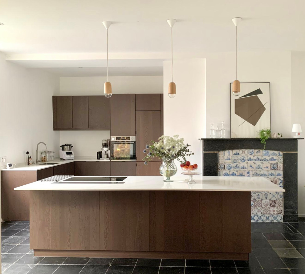 Inspiration for a large transitional l-shaped separate kitchen in Other with an undermount sink, beaded inset cabinets, granite benchtops, white splashback, granite splashback, panelled appliances, terra-cotta floors, with island, blue floor and white benchtop.