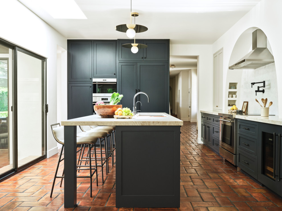 Spanish Modern - Transitional kitchen photo in Los Angeles