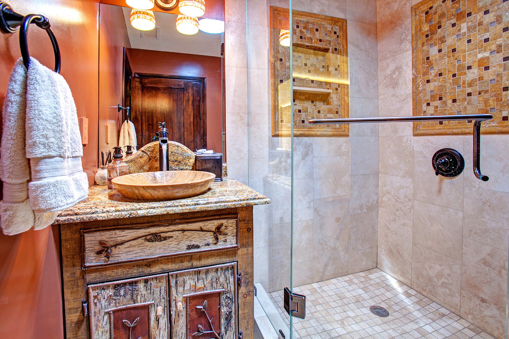 Photo of a small mediterranean 3/4 bathroom in San Diego with furniture-like cabinets, distressed cabinets, granite benchtops, beige tile, mosaic tile, a corner shower, a vessel sink, orange walls and a hinged shower door.