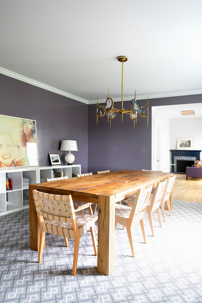 Design ideas for a contemporary dining room in New York with purple walls.