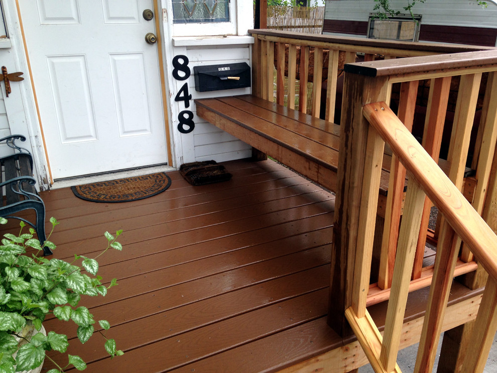 Inspiration for a small arts and crafts front yard verandah in Denver with decking.