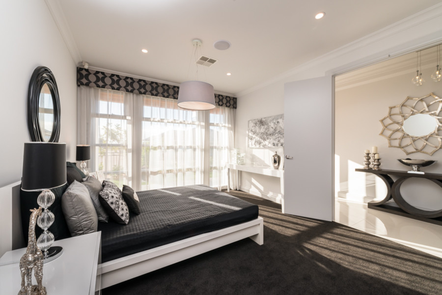 This is an example of a contemporary bedroom in Adelaide.