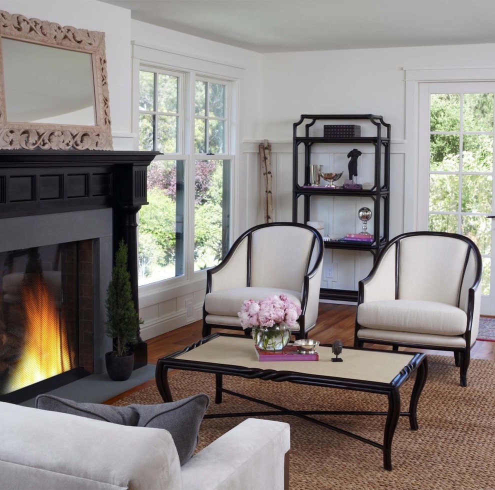 Design ideas for an eclectic living room in San Francisco with white walls and a standard fireplace.