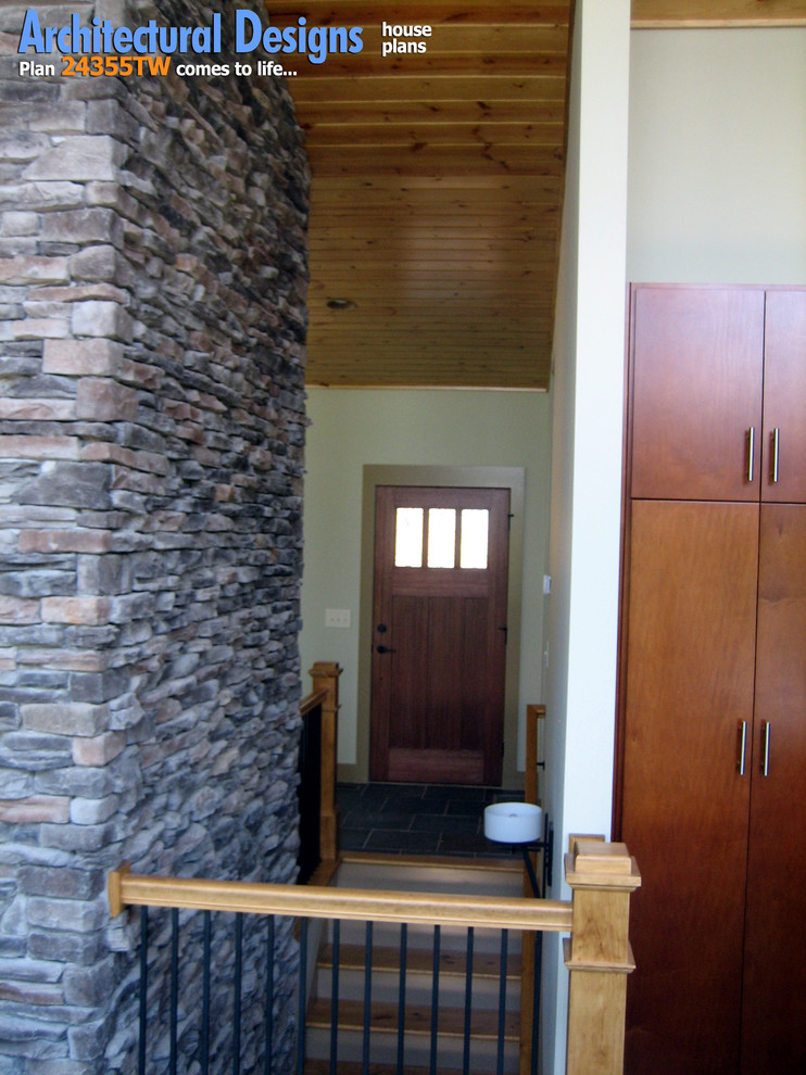 This is an example of a midcentury entryway in Atlanta.
