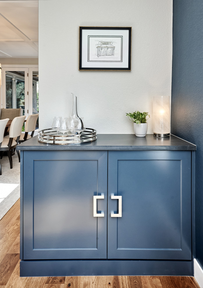 Example of a transitional home design design in Denver