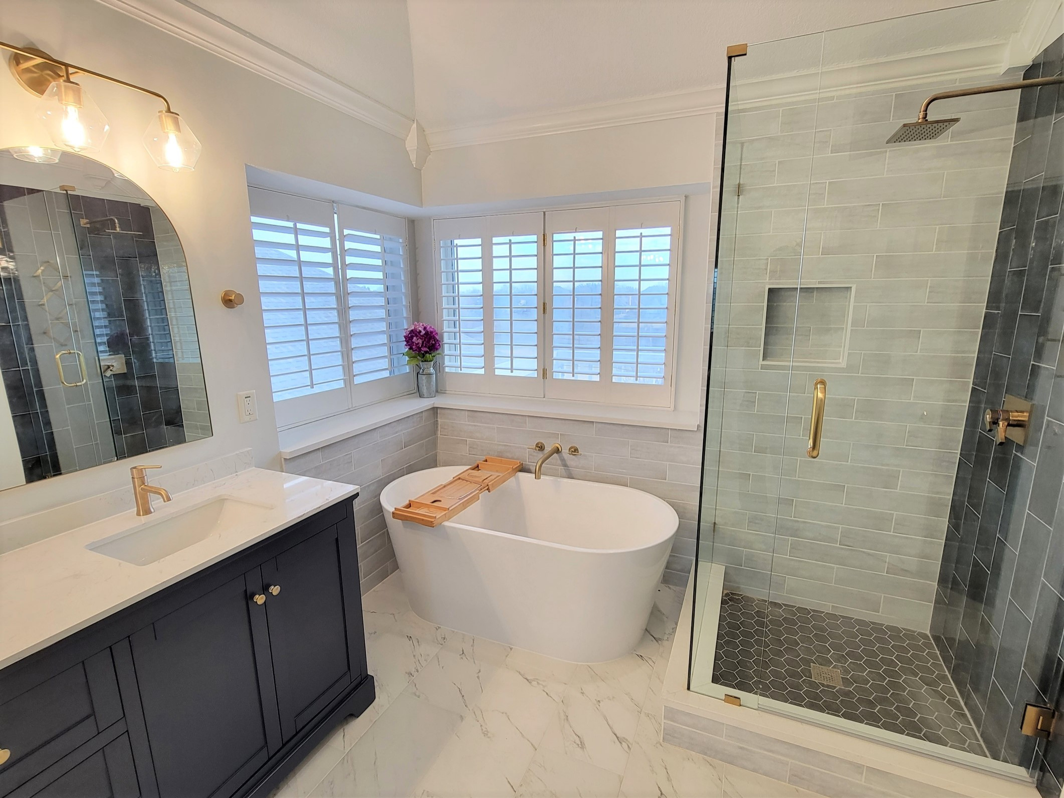 Full master bathroom remodeling: New shower, frameless glass, freestanding tub, vanity, hardware, lighting, mirrors, flooring